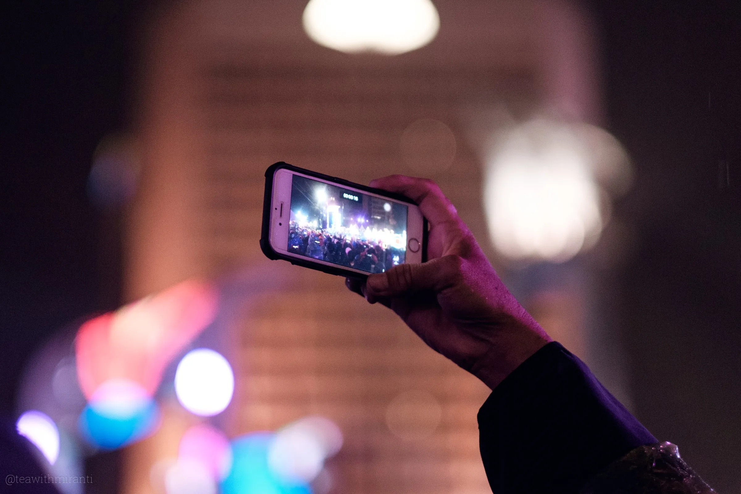 People recording the entertainment on the stage